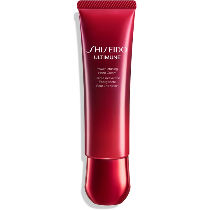 Shiseido Ultimune Power Infusing Hand Cream vahvistava käsivoide tyylikkäässä punaisessa metallinhohtoisessa tuubissa.