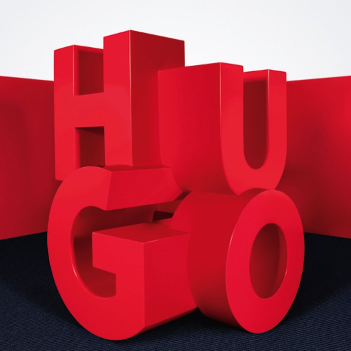 Hugo Boss Hugo Hugo Green 75 ml miesten deodorantti näyttävällä punaisella 3D HUGO-logolla ja tummalla taustalla.