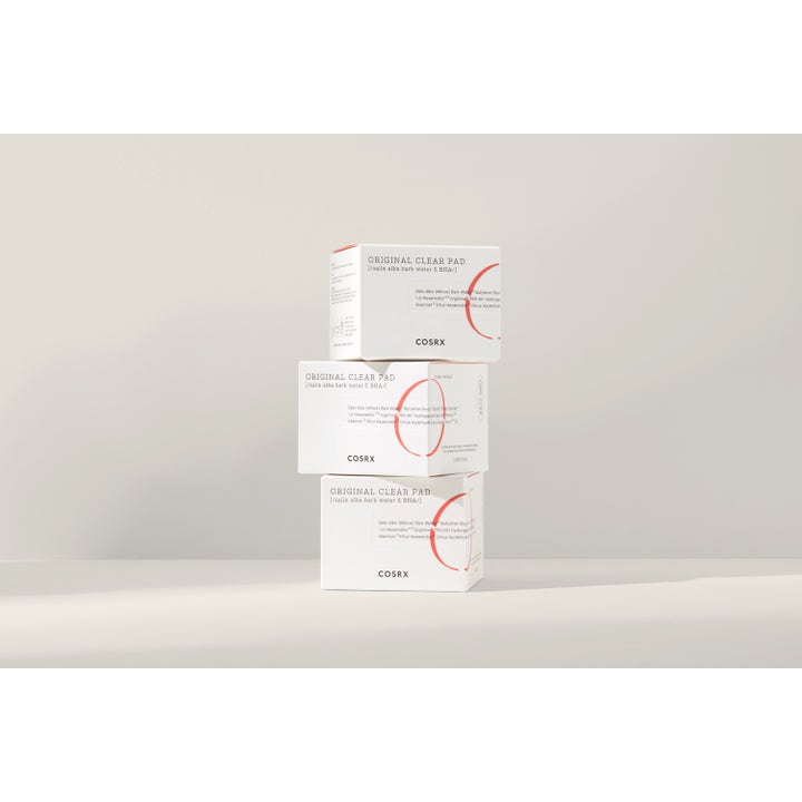 COSRX One Step Original Clear Pad 70 kpl puhdistuslappu kolme valkoista pahvipakkausta pinottuna päällekkäin.