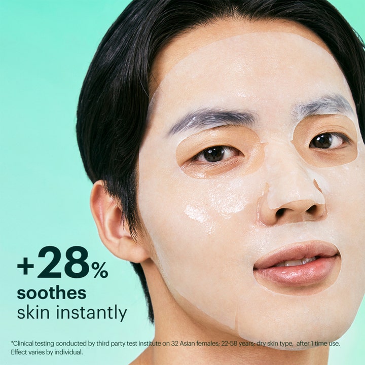 Dr.Jart+ Dermask Soothing Hydra Solution Pro 26 g rauhoittava kangasmaski kasvoilla vihreällä taustalla.