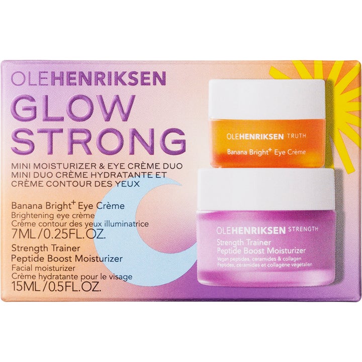 Ole Henriksen Glow Strong Mini Duo kirkastava setti, jossa oranssi ja liila voidepurkki pahvipakkauksessa.