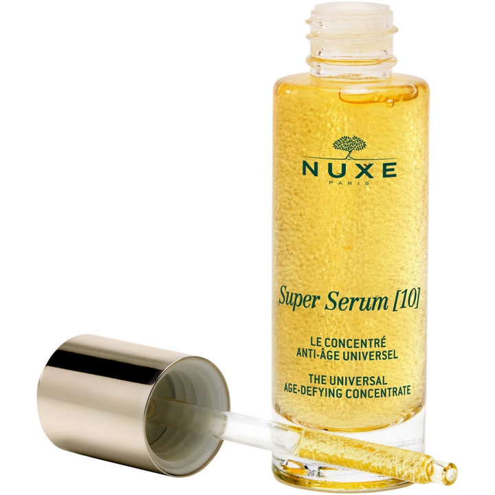 Nuxe Super Serum 30 ml juonteita silottava seerumi kultaisessa lasipullossa, jossa on pipetti.