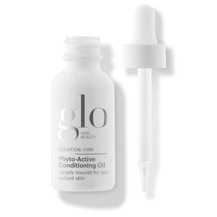 Glo Skin Beauty Phyto-Active Conditioning Oil ravitseva kasvoöljy huurteisessa valkoisessa pullossa ja valkoinen pipetti