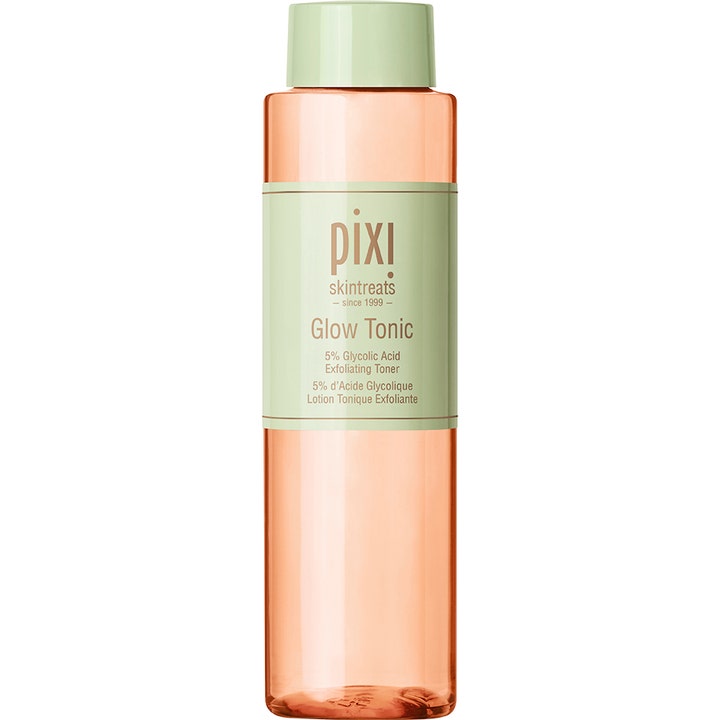 Pixi Glow Tonic 250 ml heleyttävä kasvovesi kirkastaa ihoa oranssissa muovipullossa, jossa on vaaleanvihreä korkki.