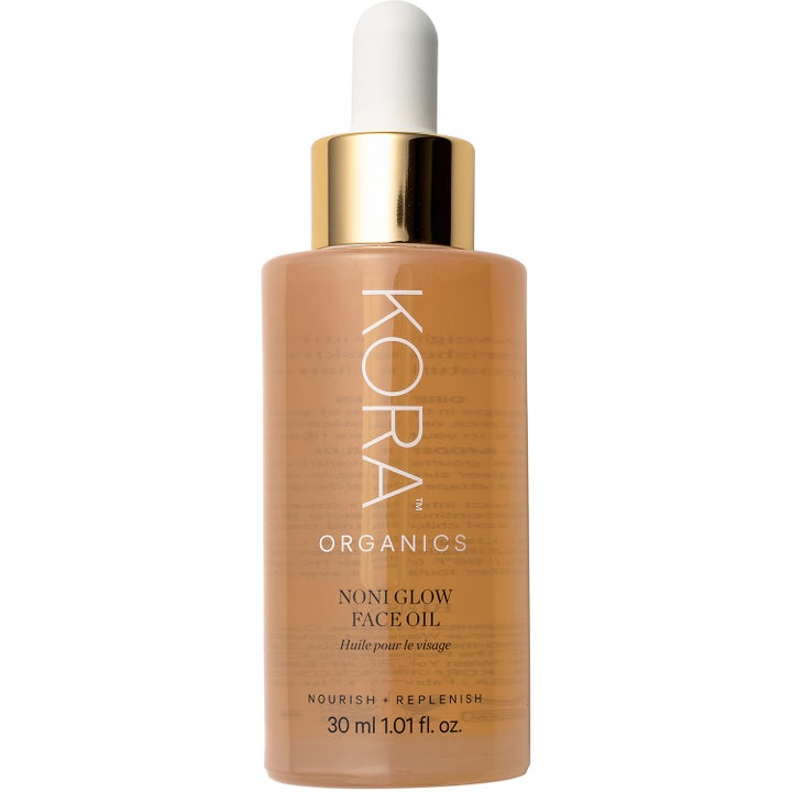 KORA Organics Noni Glow Face Oil 30 ml heleyttävä kasvoöljy kultaisessa lasipullossa jossa on kultainen korkki