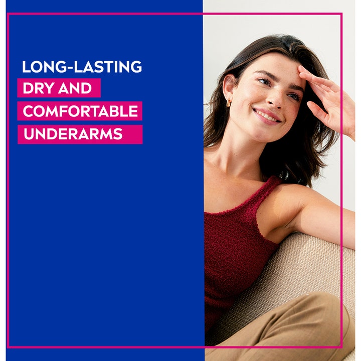 NIVEA Deo Rollon Dry Comfort 50 ml deodorantti antaa kuivat kainalot kuvassa hymyilevä nainen ja teksti Long-lasting.