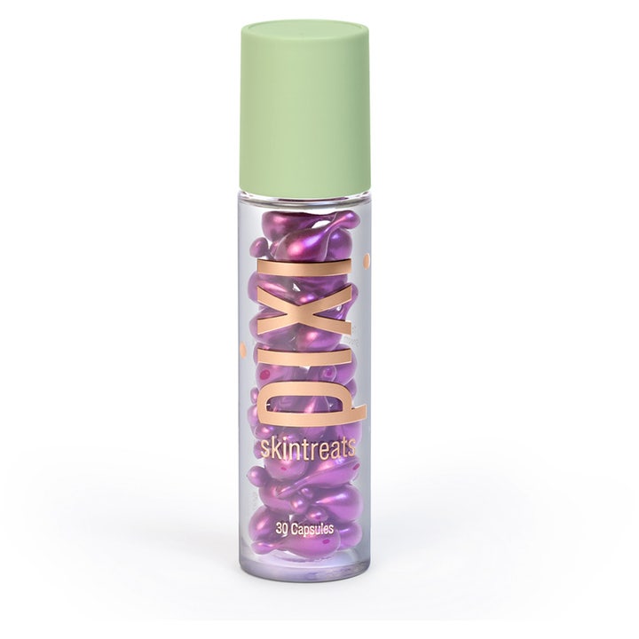 Pixi Skintreats 30 kpl elvyttävä seerumi kirkkaassa pullossa jossa on violetteja kapseleita ja vihreä korkki.