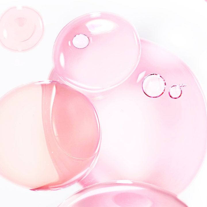 Lancôme Hydra Zen Anti-Stress Day Cream 50 ml kosteuttava päivävoide raikkaina vaaleanpunaisina pisaroina.