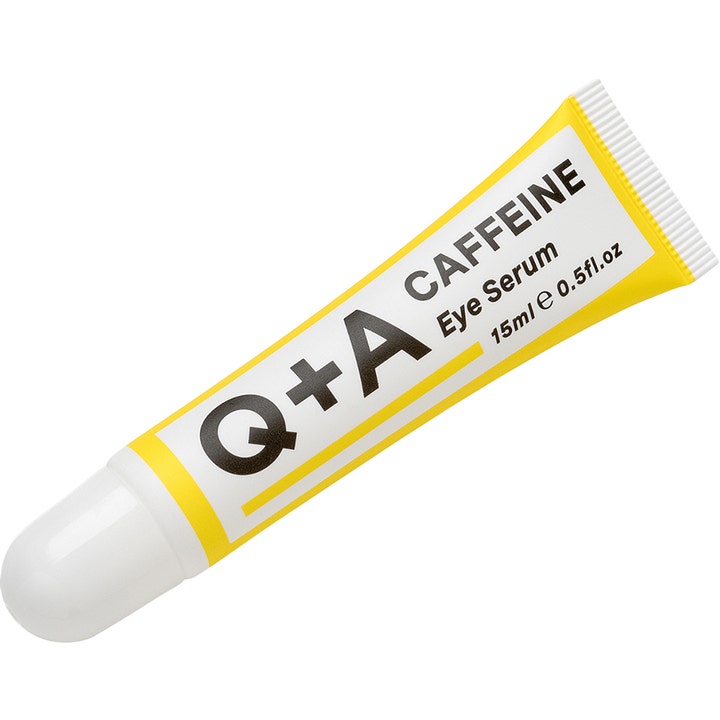 Q+A Caffeine Eye Serum 15 ml kirkastava silmänympärysseerumi keltaisessa tuubissa valkoisella korkilla.