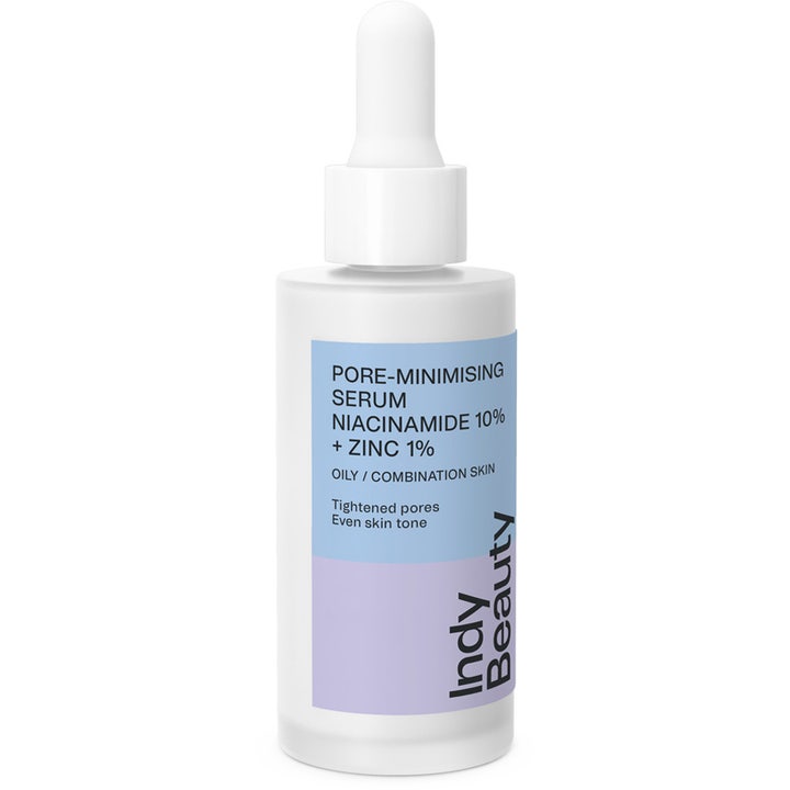 Indy Beauty Pore-Minimising Serum Niacinamide 10% + Zinc 1% supistava seerumi valkoisessa lasisessa pipettipullossa