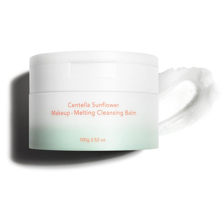 haruharu wonder Centella Sunflower Makeup-Melting Cleansing Balm 100 g puhdistusbalmi ja valkoinen voidemainen koostumus.