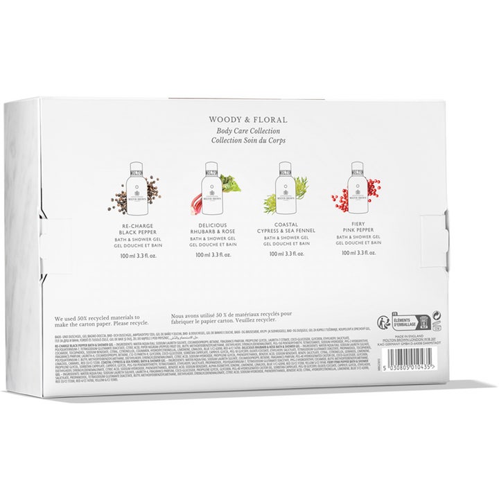 Molton Brown Body Quad 400 ml lahjapakkaus näyttää neljä 100 ml suihkugeeliä ja niiden ainesosat valkoisella pohjalla.