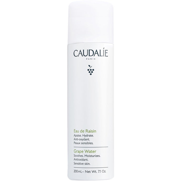 Caudalie Grape Water 200 ml rauhoittava ja kosteuttava kasvosuihke valkoisessa pullossa vihreällä ja mustalla tekstillä