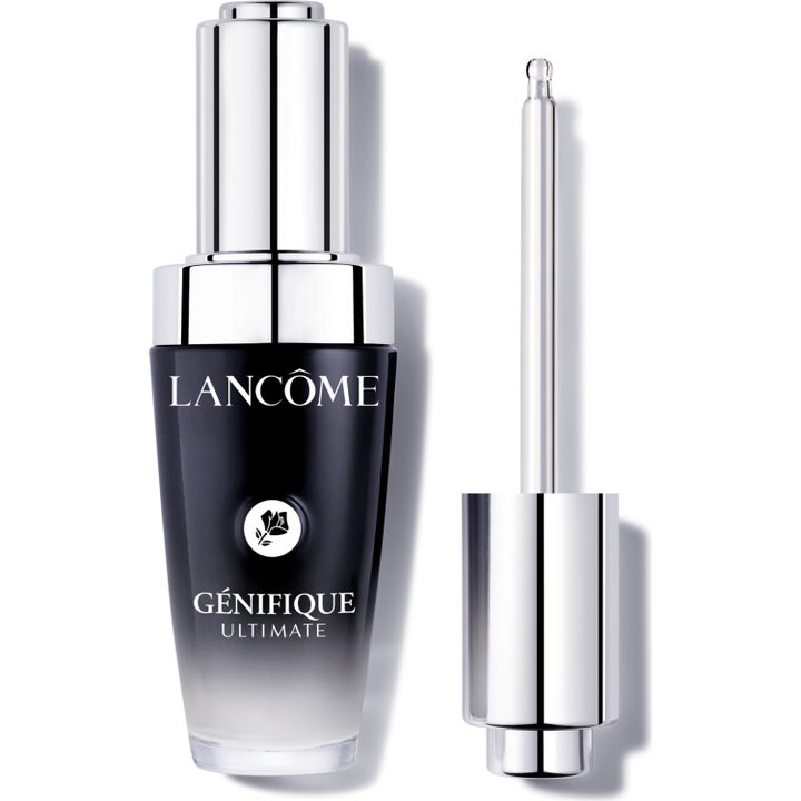 Lancôme Génifique Ultimate korjaava seerumi mustassa liukuvärjätyssä lasipullossa ja erillinen hopeinen pipetti.