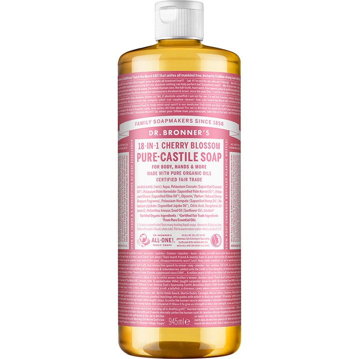 Dr. Bronner's 18-in-1 Cherry Blossom 945 ml monikäyttöinen saippua puhdistaa ihon ruskeassa pullossa pinkillä etiketillä.