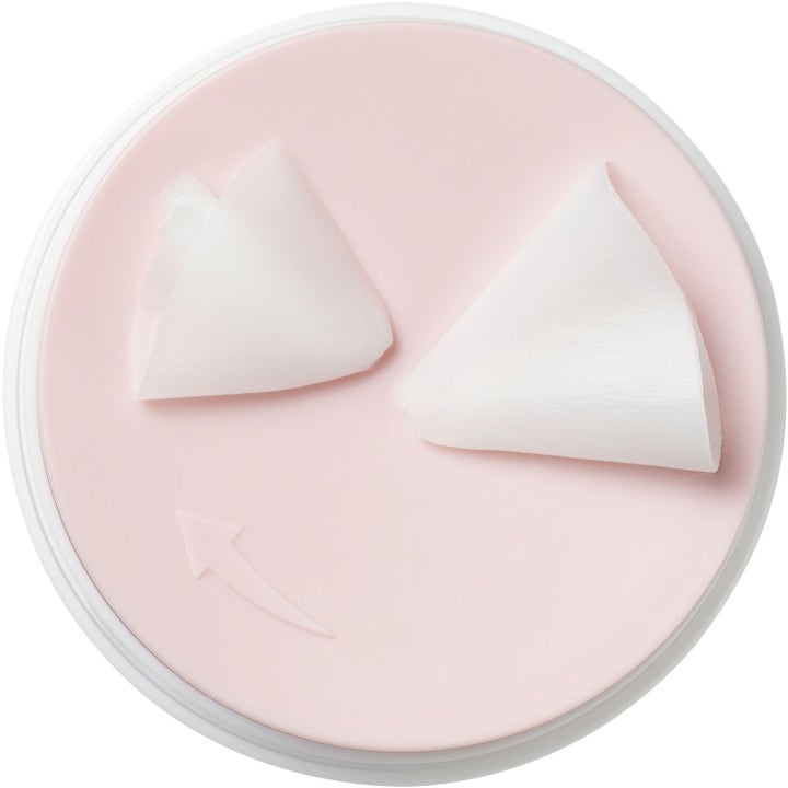 Mixsoon Collagen Cleansing Balm 50 ml puhdistusbalmi jossa on vaaleanpunainen pinta ja kaksi valkoista tekstuurinäytettä
