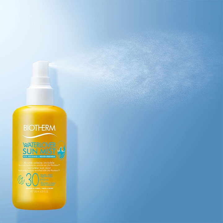 Biotherm Water Lover Sun Mist SPF30 200 ml aurinkosuihke keltaisessa pullossa vapauttamassa hienojakoista sumua