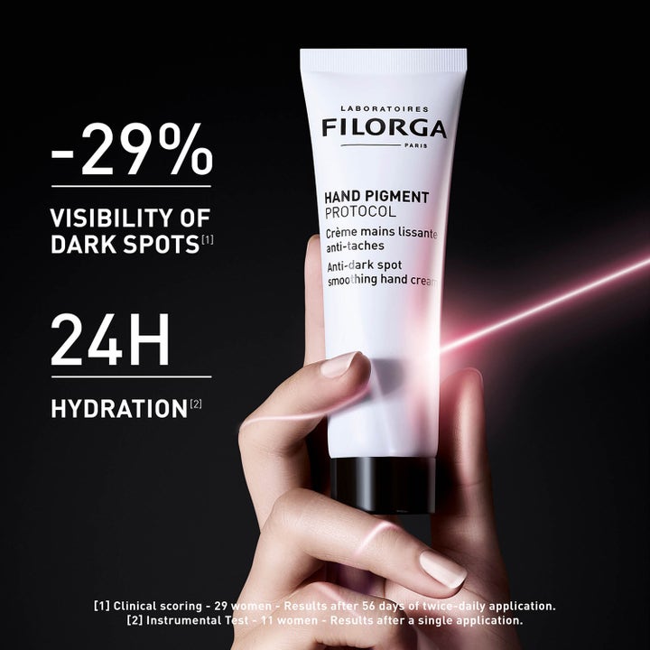 Filorga Hand Pigment Protocol 50 ml silottava käsivoide häivyttää läiskiä valkoisessa tuubissa lasersäteen kera.