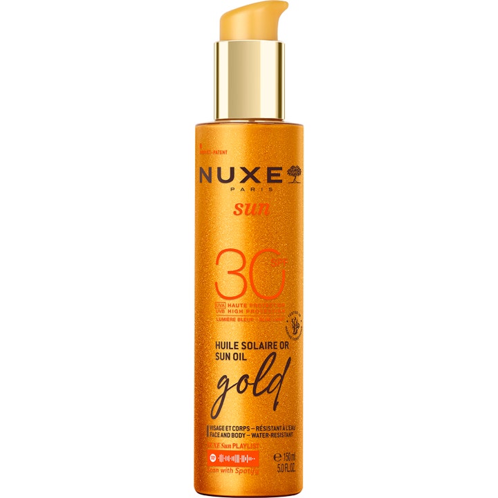 Nuxe Sun Oil Gold 150 ml SPF 30 suojaava aurinkoöljy kultaisessa kimaltelevassa pumppupullossa antaa iholle hehkua.