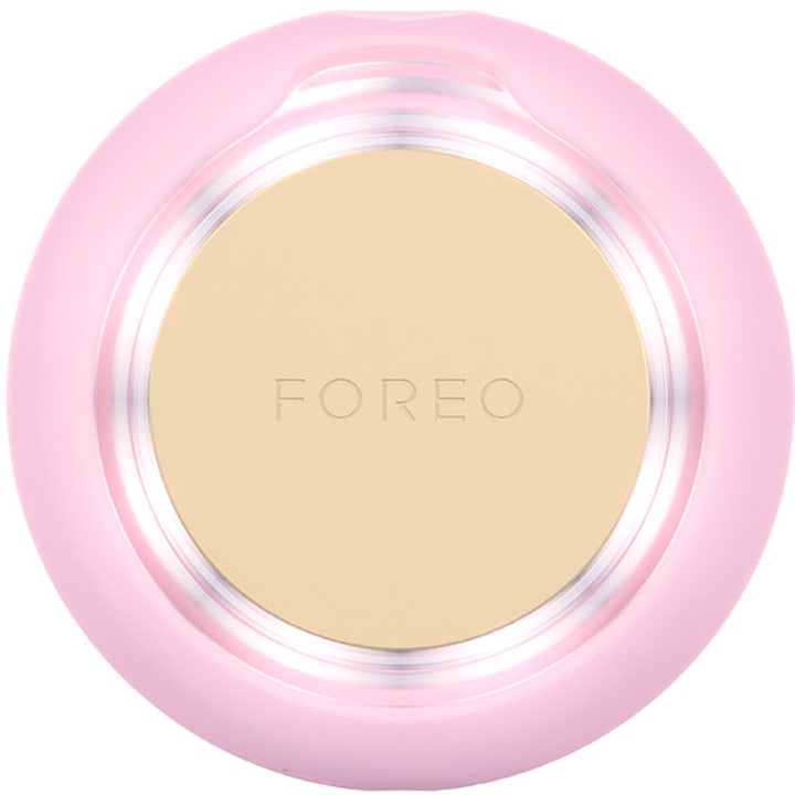 FOREO UFO™ 3 mini Pearl Pink 1 kpl kosteuttava kasvolaite vaaleanpunaisella silikonilla ja metallipinnalla.