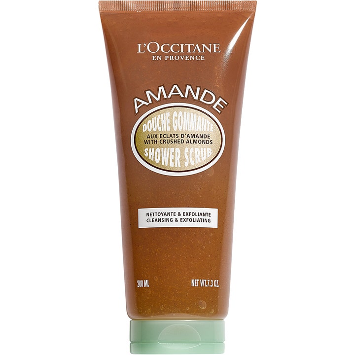 L'Occitane Amande Shower Scrub 200 ml pehmentävä suihkukuorinta ruskeassa tuubissa, jossa on vaaleanvihreä korkki.