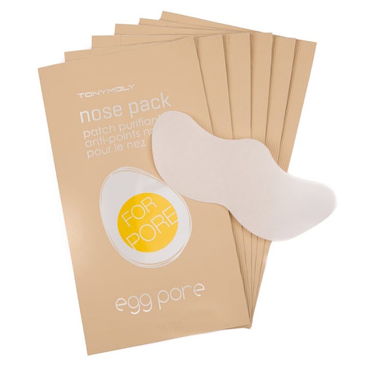 Tonymoly Egg Pore Nose Pack 7 kpl puhdistava nenälaastari ja sarja beigejä pakkauksia.