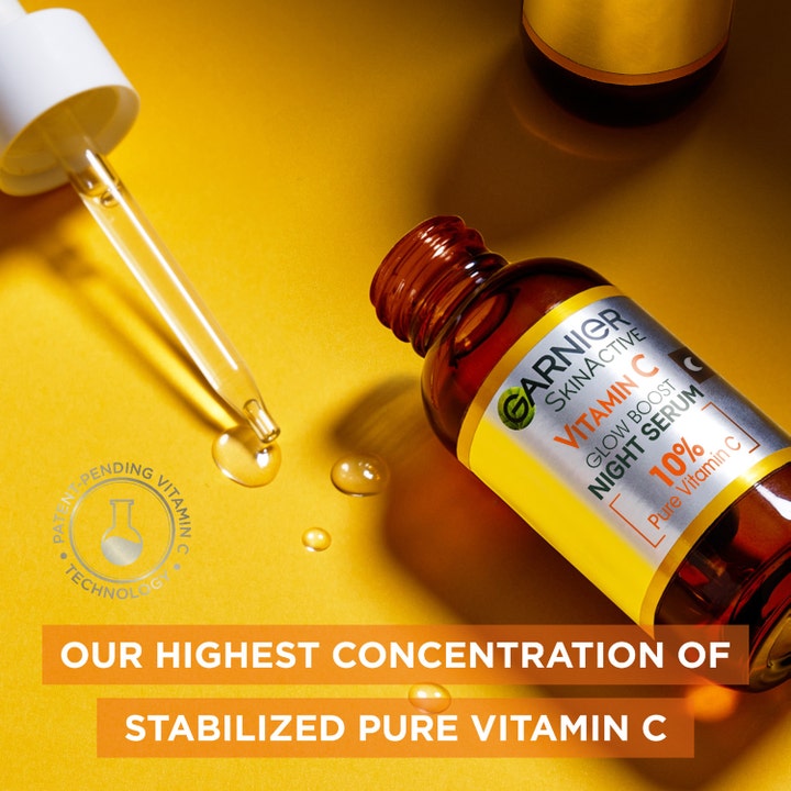 Garnier SkinActive Vitamin C 10% Night Serum 30 ml heleyttävä yöseerumi ruskeassa pullossa keltaisella taustalla
