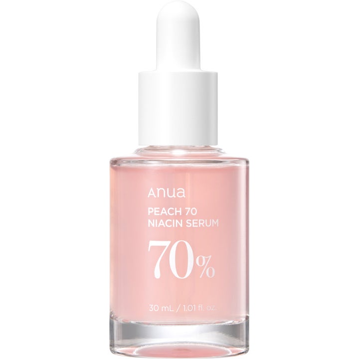 Anua Peach 70 Niacin Serum 30 ml kirkastava niasiiniamidiseerumi vaaleanpunaisessa lasisessa pipettipullossa
