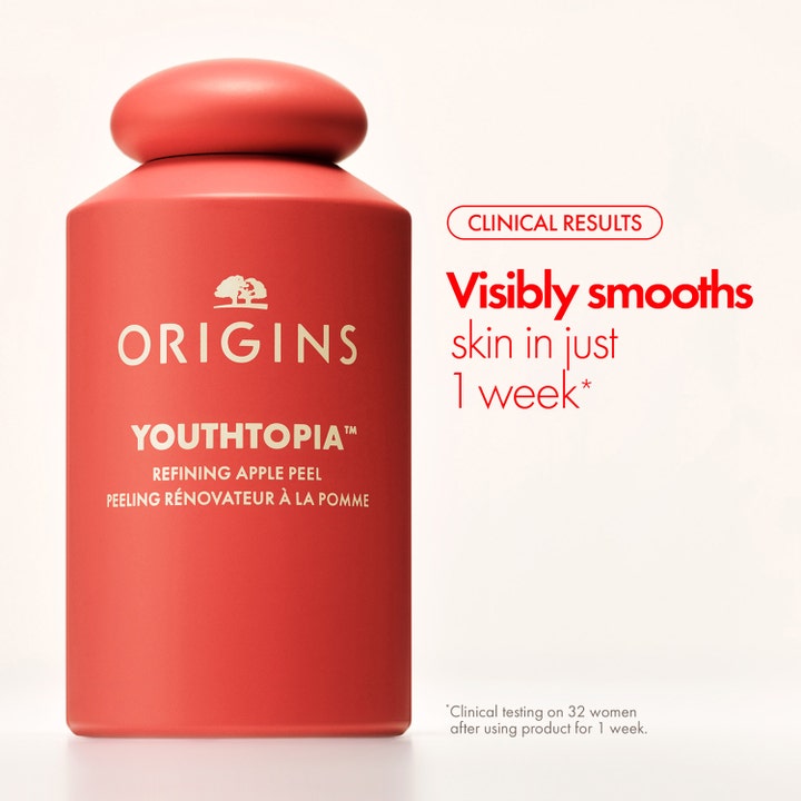 Origins Youthtopia Refining Apple Peel 100 ml tasoittava kuorinta punaisessa pullossa ja teksti silottaa ihoa viikossa