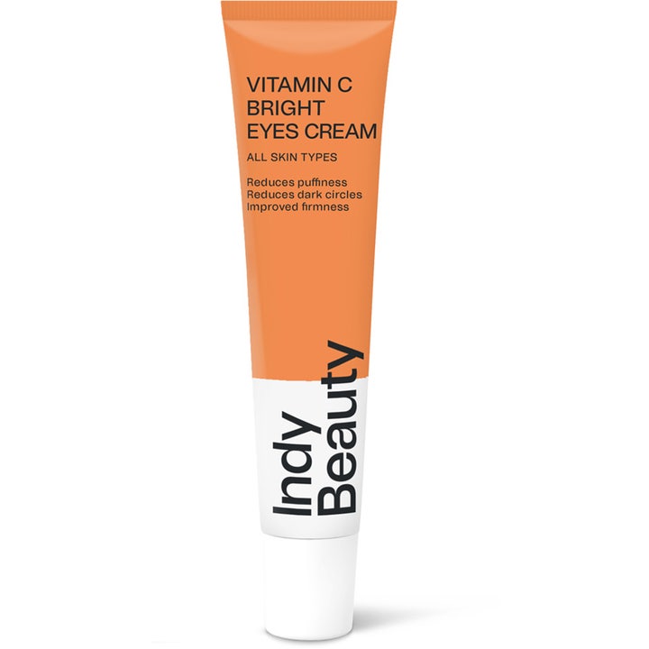 Indy Beauty Vitamin C Bright Eyes Cream 15 ml kirkastava silmänympärysvoide oranssissa ja valkoisessa tuubissa.