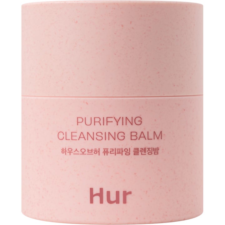 Hur Purifying Cleansing Balm puhdistava puhdistusbalsami vaaleanpunaisessa pilkullisessa purkissa