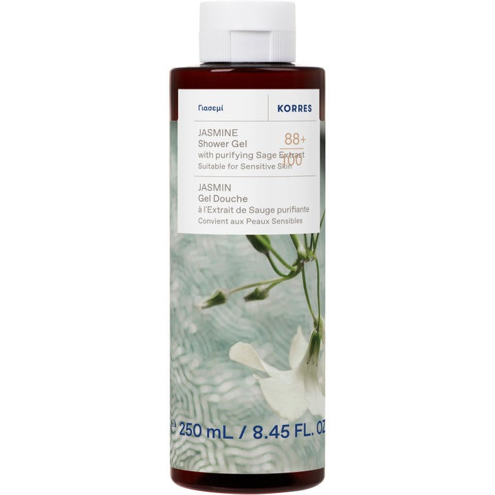 Korres Jasmine Shower Gel 250 ml puhdistava suihkugeeli tummanruskeassa pullossa valkoisella korkilla ja kukkaetiketillä.