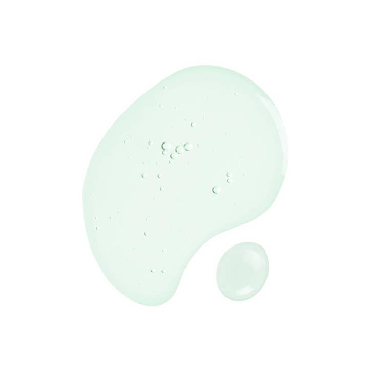 SKIN1004 Madagascar Centella Tea-Trica Relief Ampoule 100 ml rauhoittava seerumi, kevyt ja kirkas vaaleanvihreä koostumus.
