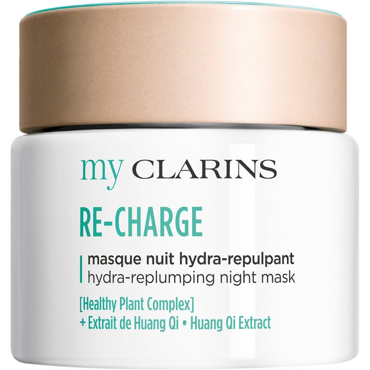 My Clarins RE-CHARGE Hydra-Replumping Night Mask kosteuttava yönaamio valkoisessa purkissa jossa on tyylikäs beige kansi