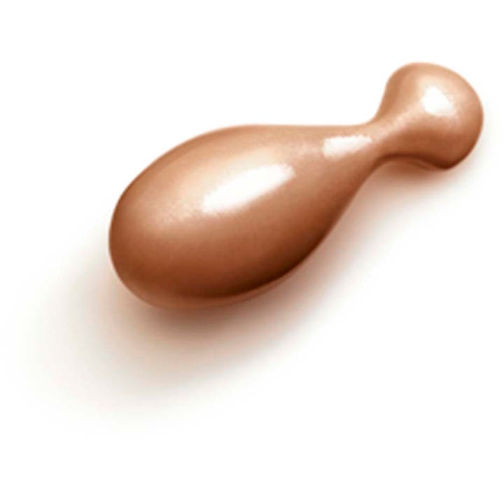Clarins Milky Boost Capsules 06 7,8 ml heleyttävä meikkiseerumi on yksittäinen helmiäishohtoinen pronssinen kapseli.