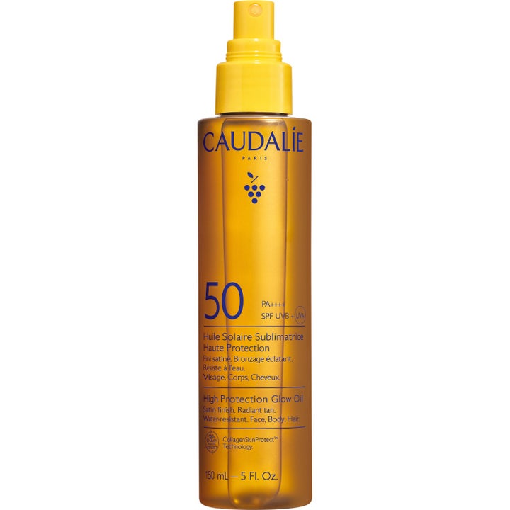Caudalie High Protection Glow Oil SPF 50 150 ml hehkua antava aurinkoöljy meripihkanvärisessä suihkepullossa
