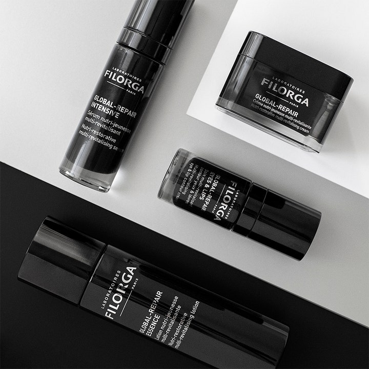 Filorga Global-Repair Intensive Serum 30 ml elvyttävä seerumi mustissa ylellisissä pakkauksissa mustavalkoisella taustalla.