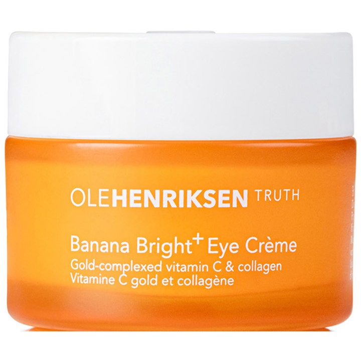 Ole Henriksen Banana Bright+ Eye Crème kirkastava silmänympärysvoide oranssissa purkissa jossa on valkoinen kansi.
