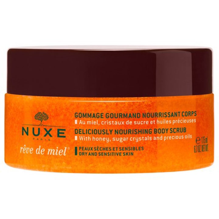 Nuxe Rêve de Miel 175 ml ravitseva vartalokuorinta pehmentää ihoa oranssissa purkissa jossa on tummanruskea kansi