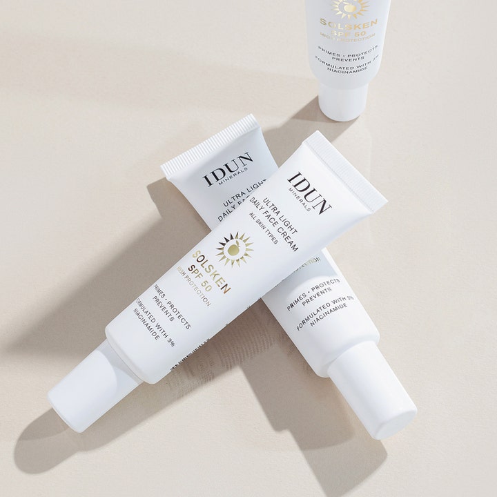 IDUN Minerals Ultra Light Daily Face Cream Solsken SPF50 30 ml suojakerroin kolmessa valkoisessa tuubissa