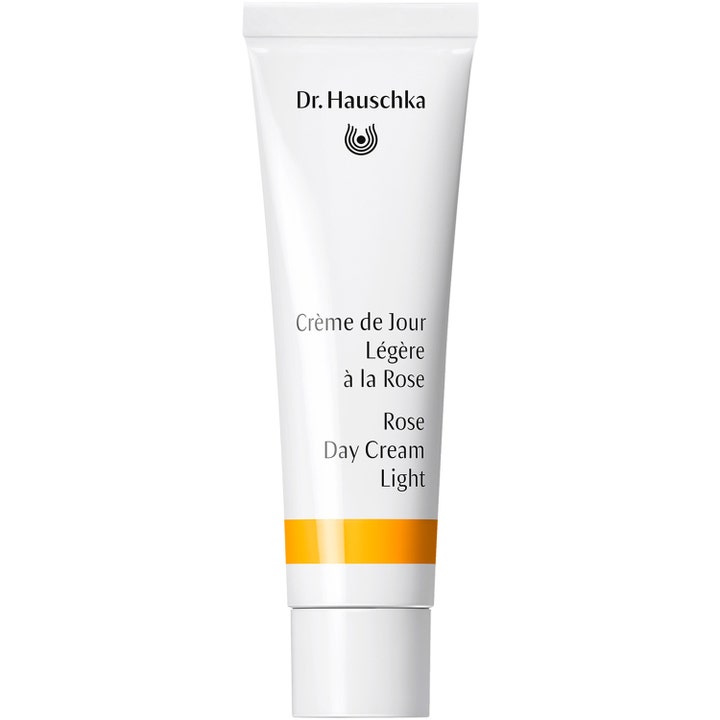 Dr. Hauschka Rose Day Cream Light 30 ml rauhoittava päivävoide valkoisessa tuubissa keltaisella raidalla