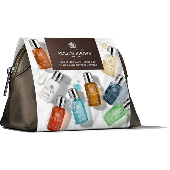 Molton Brown Mens Mini Stowaway 240 ml vartalonhoitosetti, jossa kahdeksan matkakokoista tuotetta kangaspussissa.