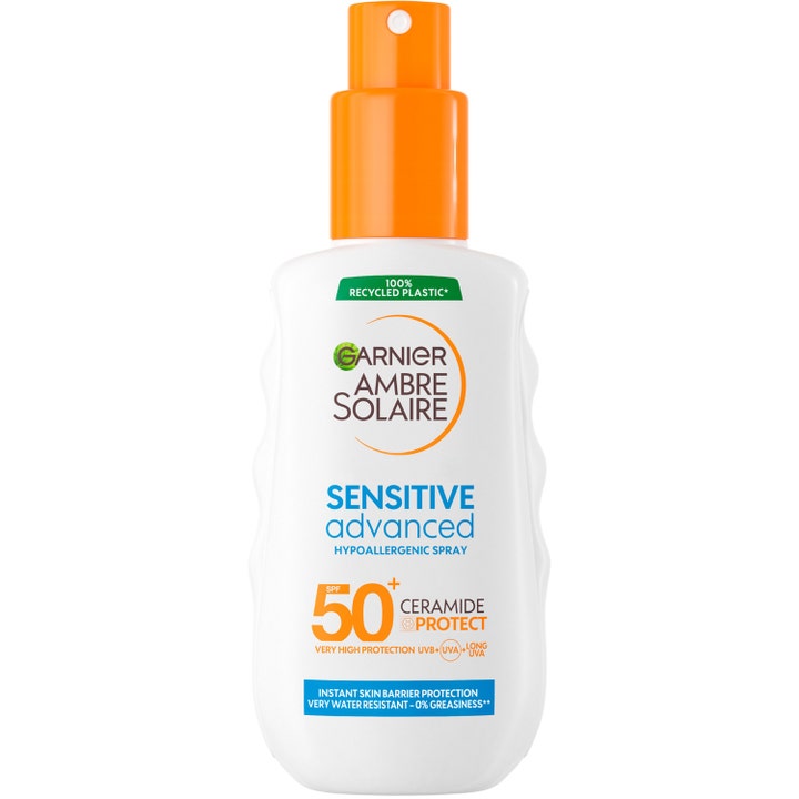 Garnier Ambre Solaire Sensitive Advanced SPF 50+ aurinkosuojasuihke vahvistaa ihoa valkoisessa pullossa oranssilla pumpulla