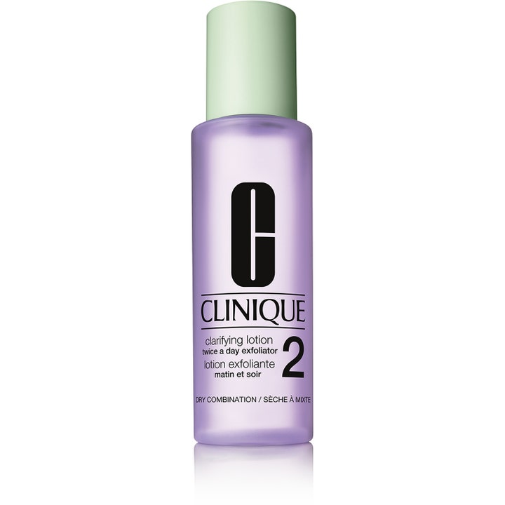 Clinique Clarifying Lotion 2 kuoriva kasvovesi kirkastaa ihoa liilassa pullossa, jossa on vaaleanvihreä korkki.
