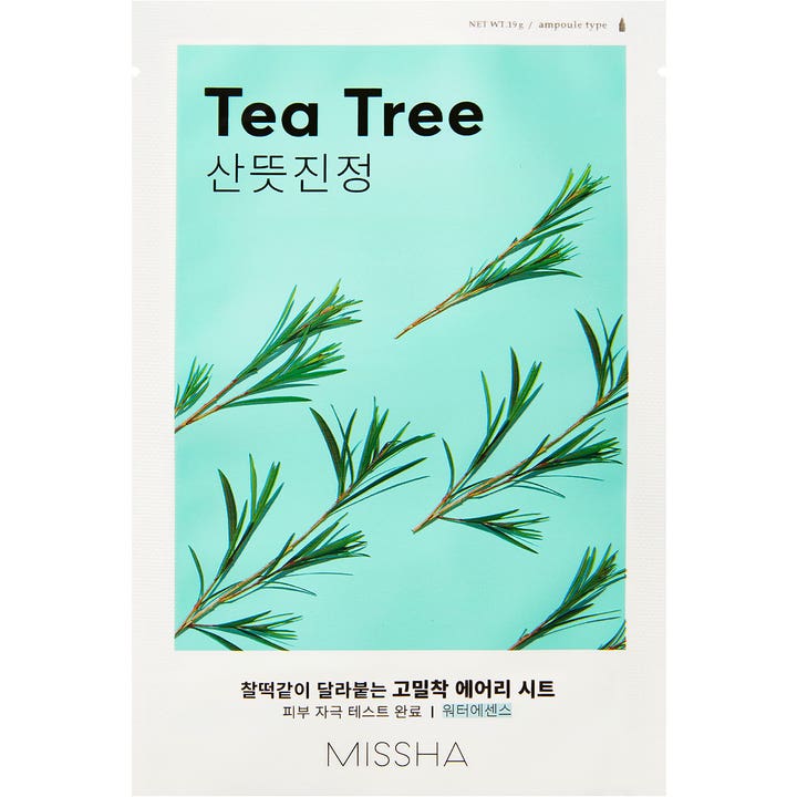 Missha Tea Tree 19 g rauhoittava kangasnaamio valkoisessa pakkauksessa jossa on mintunvihreä teepuun oksakuvio