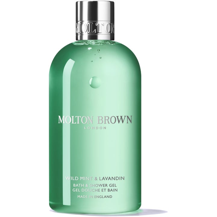 Molton Brown Wild Mint & Lavandin 300 ml virkistävä suihkugeeli kirkas pullo vihreällä nesteellä ja hopeakorkilla