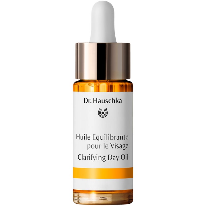 Dr. Hauschka Clarifying Day Oil tasapainottava kasvoöljy kirkastaa ihoa lasisessa pipettipullossa hopeisella korkilla.