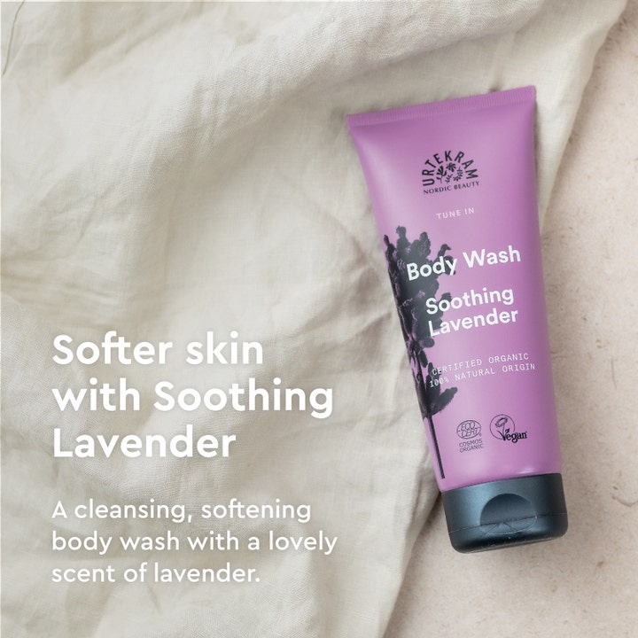 Urtekram Body Wash Soothing Lavender 200 ml rauhoittava suihkugeeli liila tuubi vaalealla kankaalla