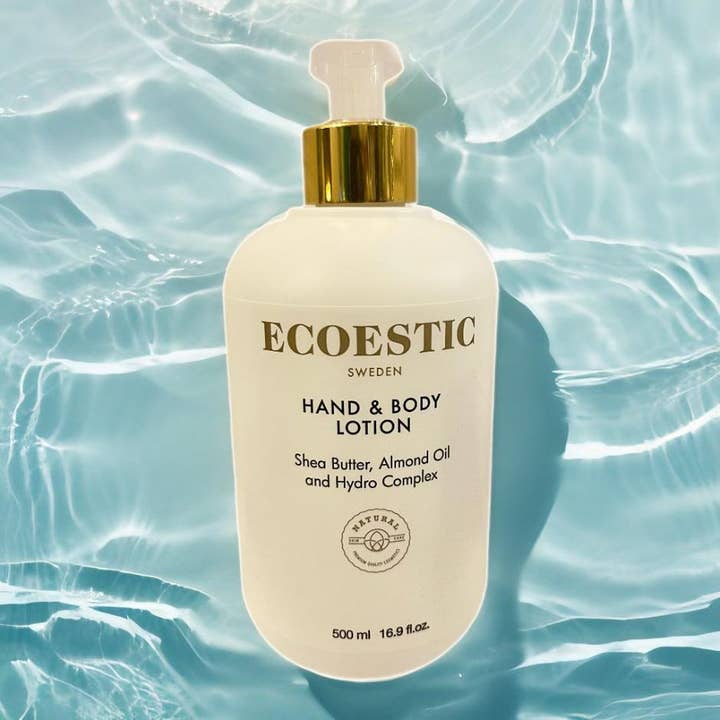ECOESTIC Hand & Body lotion 500 ml ravitseva vartalovoide sheavoilla valkoisessa pullossa kultaisella pumpulla