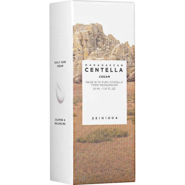 SKIN1004 Madagascar Centella Cream 30 ml rauhoittava kasvovoide valkoisessa pahvipakkauksessa, jossa on vuoristomaisema.